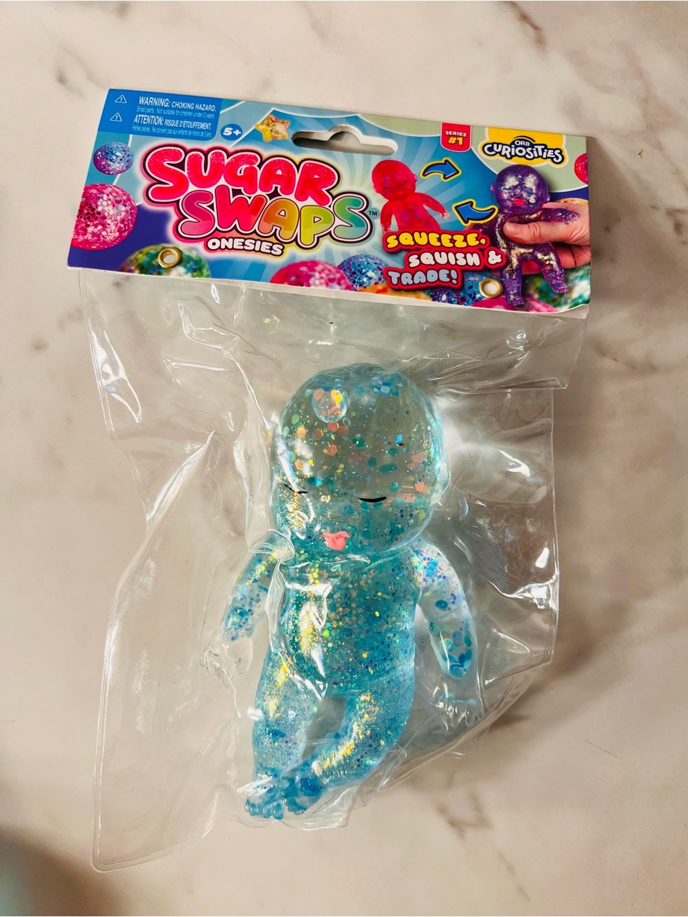 Sugar Swaps Onesies Blue Glitter Squishy Toy